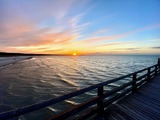 Ferienwohnung in Prerow - Haus zur See - WG Gruzdz - Sonnenuntergang von der Seebrücke aus gesehen