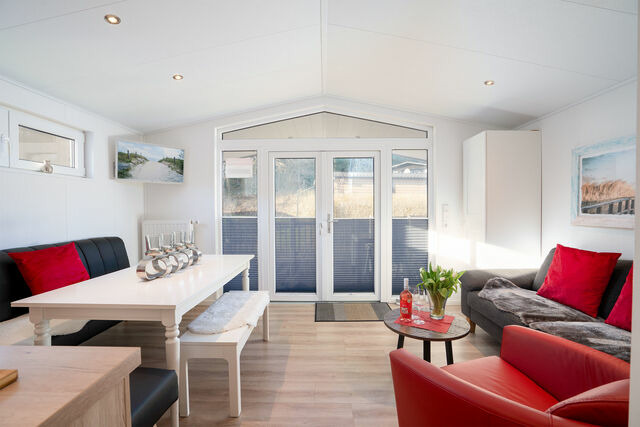 Ferienhaus in Scharbeutz - Casa del Sol Scharbeutz - Sauna kostenlos - 1 kleiner Hund willkommen - umz&auml;unter Garten - Bild 6