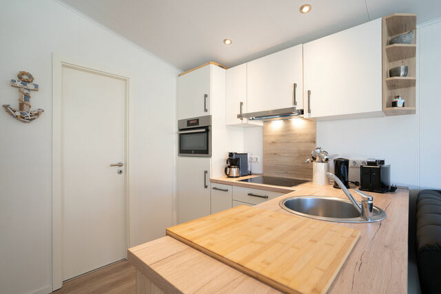 Ferienhaus in Scharbeutz - Casa del Sol Scharbeutz - Sauna kostenlos - 1 kleiner Hund willkommen - umz&auml;unter Garten - Bild 10