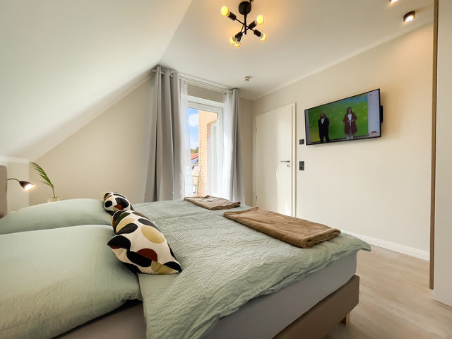 Ferienwohnung in Gr&ouml;mitz - A4 - Haus Deichwind | K&ouml;nigsberger Allee 36 - FERIENDOMIZIL HOLLICH - Bild 14